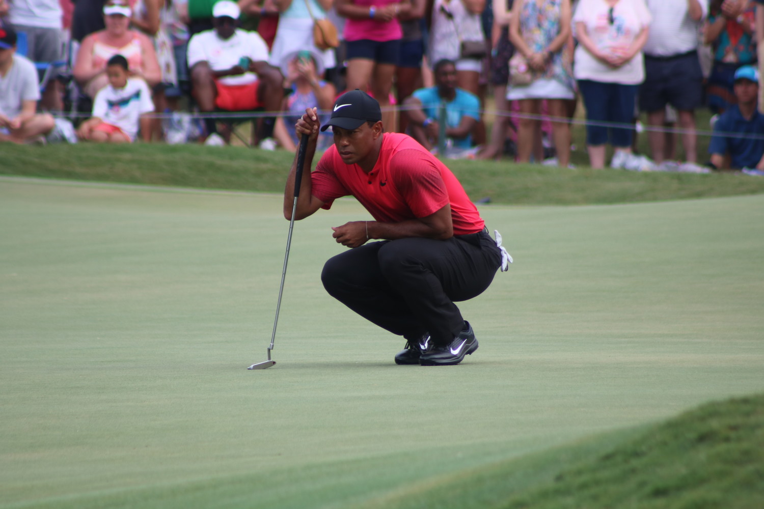 Tiger Woods eyes up a shot at THE PLAYERS Championship 2018 in Ponte Vedra Beach.